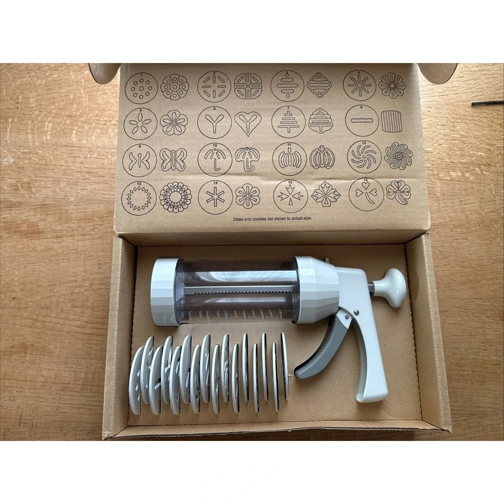 The Pampered Chef 1525 Cookie Press with 16 Discs - White